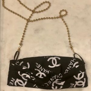 MASK NECKLACE In Gold color